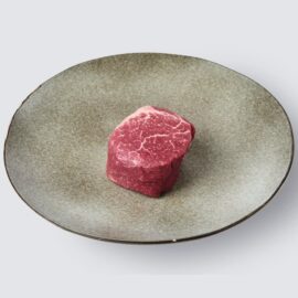 A thick, perfectly cut Grassfed Beef Fillet Steak on a clean background.
