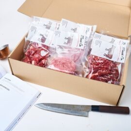 A curated selection of premium Halal beef cuts from the Beef Essential Pack, including steaks, shabu slices, and diced beef.