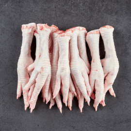 A batch of clean, high-quality frozen chicken feet ready for packaging and sale.