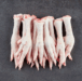 A batch of clean, high-quality frozen chicken feet ready for packaging and sale.