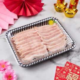 Close-up of beautifully marbled Dingley Dell Pork Jowl Fillet Yakiniku slices ready for grilling.