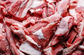 Bulk-packed cartons of fresh, frozen 70/30 lamb trim meat ready for wholesale distribution.