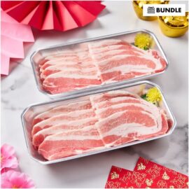 Thinly sliced, marbled Kurobuta pork belly yakiniku fanned out on a plate, ready for grilling.