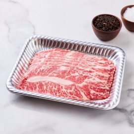 Paper-thin slices of USDA Short Ribs Boneless Shabu, showcasing beautiful marbling, ready for hot pot.
